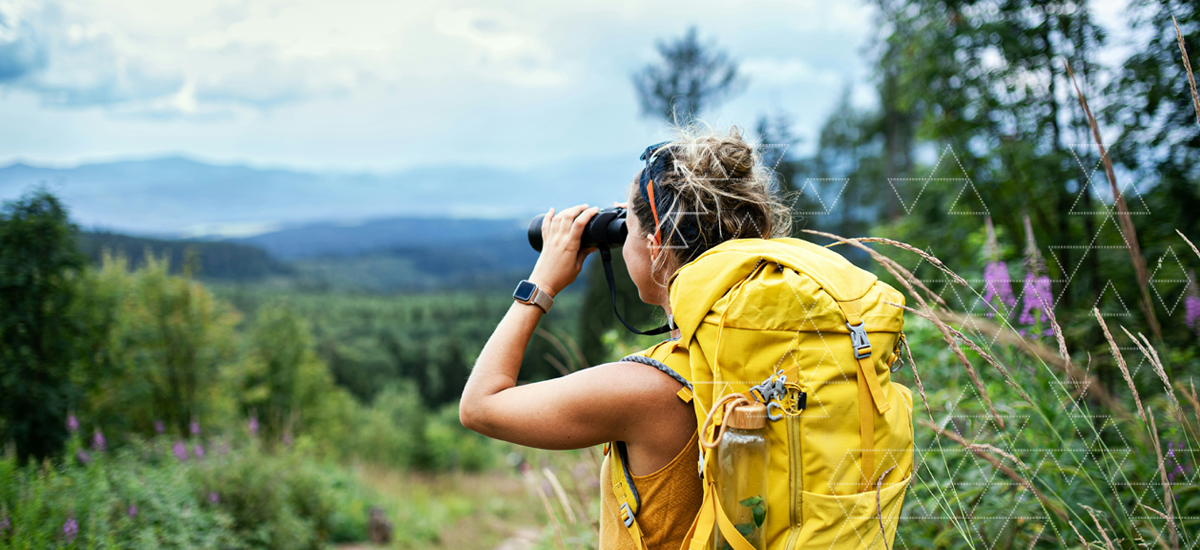 Hiker, yellow back pack, binoculars, vision